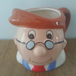 Brittisk Tatley Tea Gaffer Channky samlarmugg keramik leende huvud