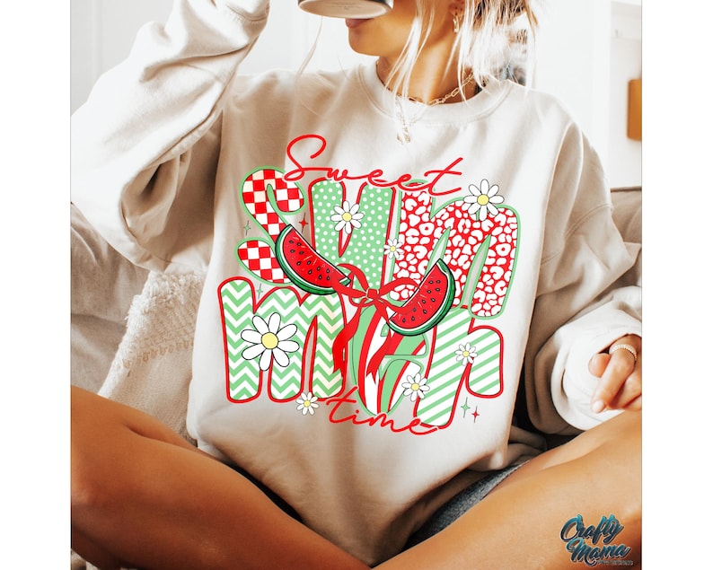 May include: A white sweatshirt with the text "Sweet Summer Time" in red and green letters. The letters are decorated with watermelon slices, daisies, and checkered patterns.