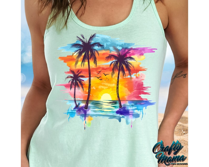 May include: A light blue tank top with a watercolor design of palm trees and a sunset over the ocean. The design is in shades of orange, yellow, pink, purple, and blue.