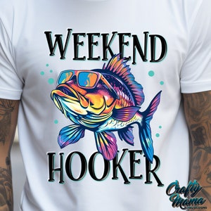 May include: A white t-shirt with the text "Weekend Hooker" printed on it. A colorful fish with sunglasses is in the center of the text.