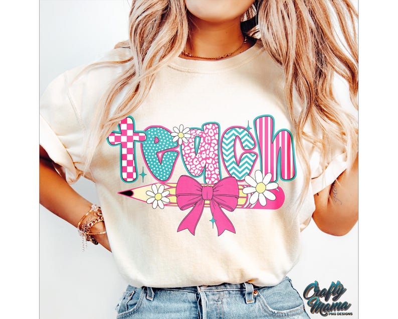 May include: A white t-shirt with the word "teach" in colorful patterned letters. The letters are decorated with a pencil, a bow, and flowers.