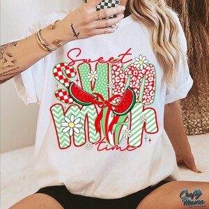 May include: White t-shirt with a colorful graphic design that says "Sweet Summer Time". The design features watermelon slices, flowers, and geometric patterns.