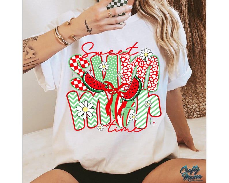May include: White t-shirt with a colorful graphic design that says "Sweet Summer Time". The design features watermelon slices, flowers, and geometric patterns.
