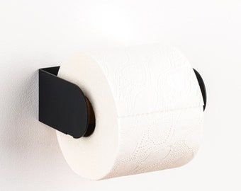Moderner Toilettenpapierhalter - Peleton Schwarz. Aufhängung mit 3M VHB Strip oder farbigen Schrauben (beide im Lieferumfang enthalten). Niederländisches Design