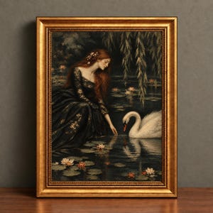 May include: A framed painting depicting a person with long red hair wearing a dark, floral-patterned dress, reaching towards a white swan swimming in a dark pond filled with lily pads and flowers, enclosed in an ornate, metallic gold frame.