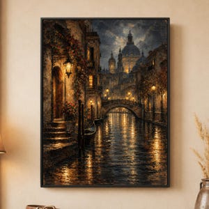May include: A framed vertical wall art print depicting a dark, atmospheric Venetian canal scene at night. The painting features a stone bridge, a gondola moored by steps, glowing street lamps, and a large domed cathedral in the background.