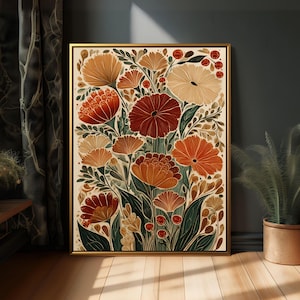 May include: A framed floral art print featuring a vibrant arrangement of stylized flowers in shades of orange, red, and cream. The botanical illustration includes detailed leaves and berries, set against a cream background, and framed in a gold tone.