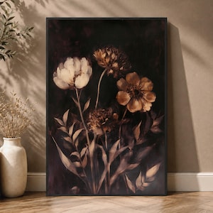 May include: A rectangular wall art print in a black frame featuring a dark, moody floral composition. The artwork displays several flowers in shades of cream, beige, and deep brown against a near-black background, with visible stems and leaves.