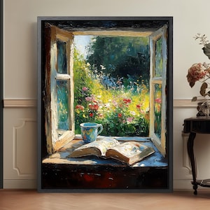 May include: An oil painting in a black frame depicting an open window looking out onto a vibrant garden with yellow and red flowers. On the wooden windowsill sits an open book and a blue patterned mug, illuminated by bright natural sunlight.