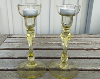 Two yellow crystal glass candle and T-light holders. Swedish vintage 1980s.