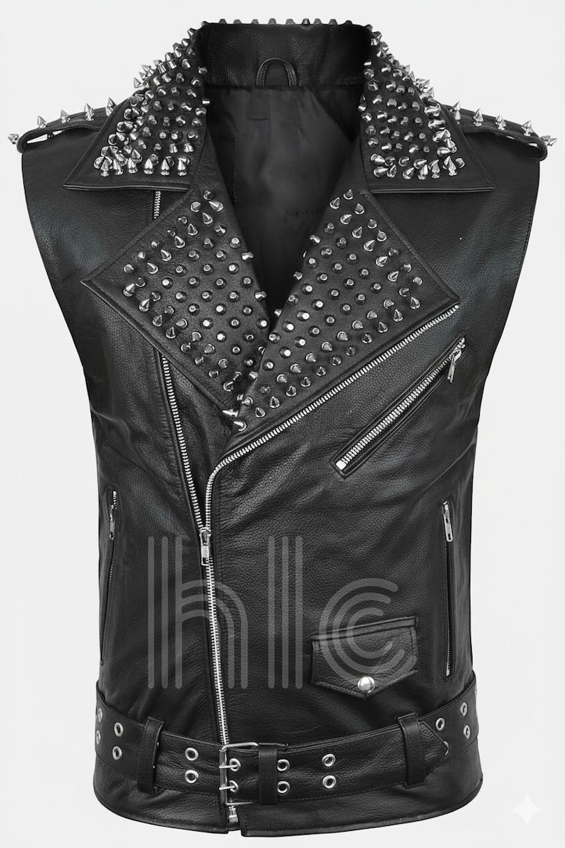 May include: Black leather vest with silver metal cone studs on the collar and shoulders. The vest has a zippered front, multiple pockets, and a belt with a buckle at the waist. A stylish, edgy fashion item.