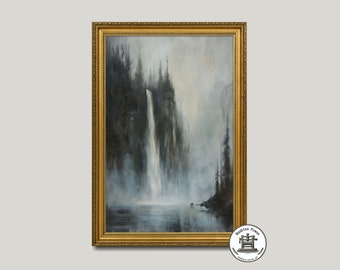 May include: An oil painting in a gold ornate frame depicts a waterfall cascading into a misty lake. The artwork features dark green trees and a moody, atmospheric color palette of blues, grays, and whites. The painting is signed with a circular logo.