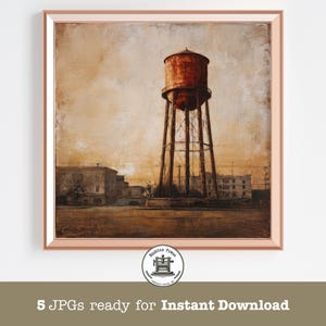 May include: Framed art print featuring a vintage water tower in a sepia tone. The artwork depicts the water tower with a rusty red tank and a network of support beams. Buildings and a muted sky complete the scene.
