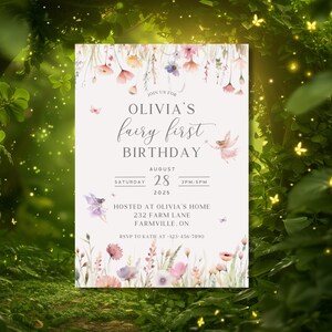May include: A fairy-themed birthday invitation with floral and butterfly illustrations. The invitation features the text "Olivia's fairy first birthday" with the date, time, and location details. The design includes watercolor flowers and a fairy illustration.