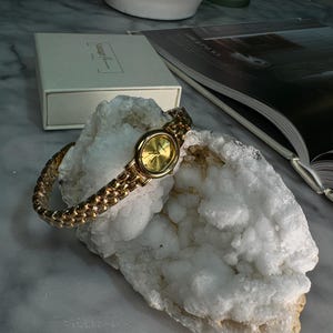 Vintage gold women’s watch, timeless watch, gold waterproof watch, stainless steel, chic, elegant, retro chic, statement piece, vintage chic