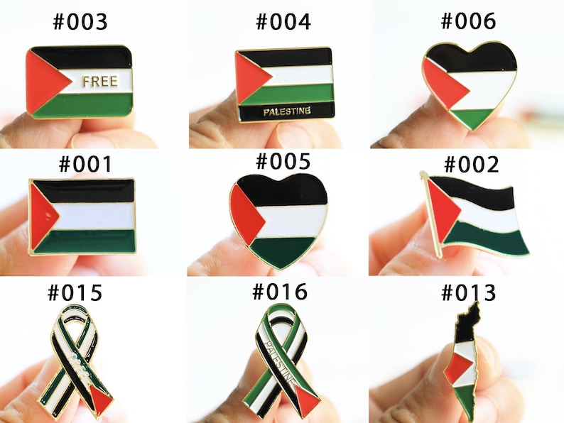 May include: Collection of Palestine flag pins in various shapes, including square, rectangle, heart, and ribbon designs. The pins feature the colors red, white, black, and green, with some including the word "FREE" or "PALESTINE".