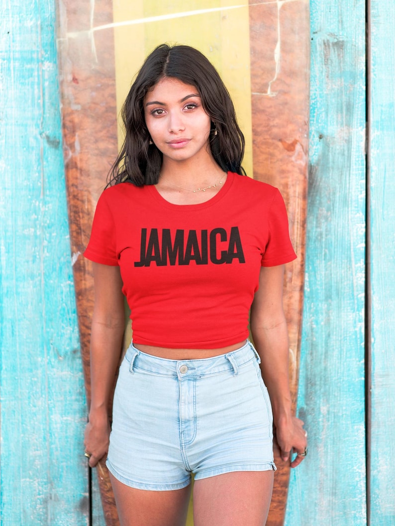 Red T-Shirt Bold Jamaica lettering in black. Highlighting the Caribbean and Jamaican vibes for women