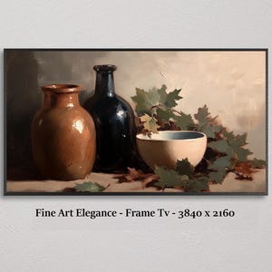 May include: A still life painting featuring a brown ceramic jar, a dark blue bottle, and a cream-coloured bowl with a blue interior. Green and brown leaves are arranged around the objects. The painting is framed in black.