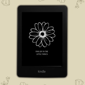 May include: Black and white image on a Kindle e-reader. The image is a stylized flower with the text "Find joy in the little things". The Kindle logo is at the bottom of the screen.