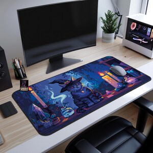 May include: A black cat wearing a witch's hat sits on a purple and blue desk mat with a crystal, candles, and potion bottles. The mat has a design of a forest scene with a magical theme.