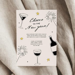May include: A New Year's Eve party invitation with a black and white illustration of a martini glass, a wine glass, and a bottle of wine. The text reads "Cheers to the New Year!" and includes details about the party, such as the date, time, and location.