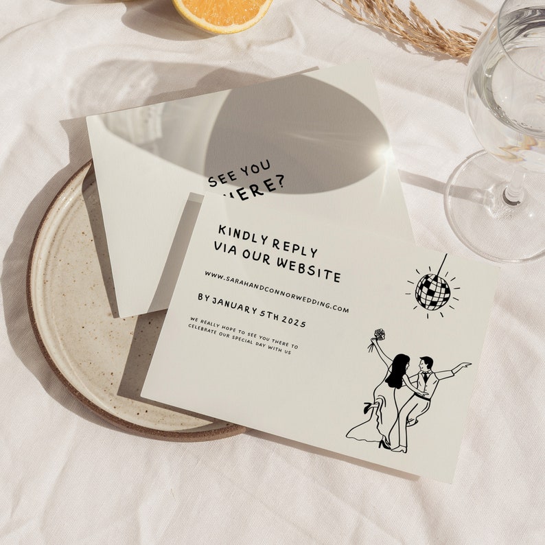 May include: A white RSVP card with black text that reads "See you there?"  "Kindly reply via our website"  "www.sarahandconnorwedding.com"  "By January 5th 2025"  "We really hope to see you there to celebrate our special day with us".  The card also features a black and white illustration of a couple dancing with a disco ball.