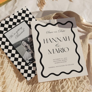 May include: A black and white checkered save the date card with a photo of a couple in a car. The text on the card reads "We're getting married!" and "Save the Date Hannah & Mario October 11, 2025 Shustoke Barns, Warwickshire Formal Invitation to Follow."