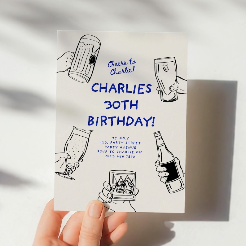 May include: A white invitation card with black and blue text. The text reads "Cheers to Charlie!" "Charlie's 30th Birthday!" "27 July 123, Party Street Party Avenue RSVP to Charlie on 0123 456 7890". The card is decorated with black line drawings of various alcoholic beverages, including beer, wine, and whisky.