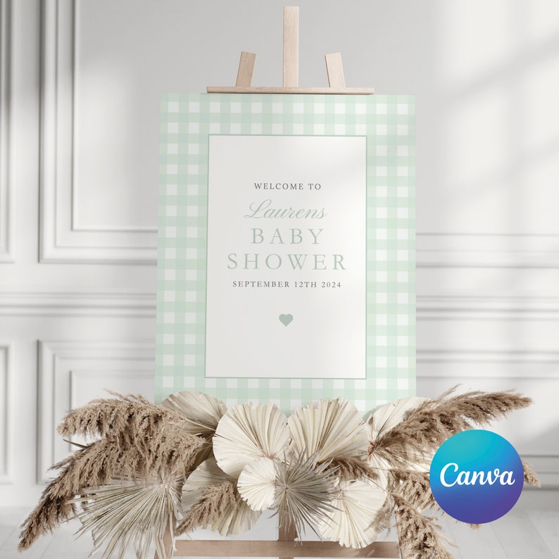 Puede incluir: Un cartel de bienvenida para un baby shower con un patr&oacute;n de cuadros vichy verde y blanco. El cartel dice "Bienvenido a Laurens Baby Shower Septiembre 12th 2024".