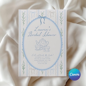 May include: A light blue and white bridal shower invitation with the text "Lauren's Bridal Shower." The invitation features an oval design with a teapot and teacups illustration. The background has a striped pattern with bows and floral accents.