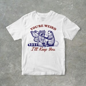 You're Weird, I'll Keep You Funny Raccoon And Possum Graphic T Shirt, Unisex Adult T Shirt, Gift For Her, Gift For Him, Raccoon T Shirt White