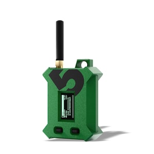May include: A green handheld electronic device with a black antenna and a digital display screen. The device features a large black number 5 printed on the front, two small black buttons at the bottom, and text on the screen reading S5 MINITREKKER.