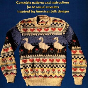 May include: The cover of "Countryknits" shows a knitted sweater with a blue backdrop. The sweater displays a pattern of hearts, geese, and floral motifs. The text reads "Complete patterns and instructions for 23 casual sweaters inspired by American folk designs."