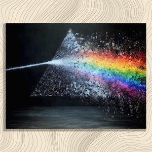 May include: A digital art print featuring a black triangle refracting a beam of white light into a vibrant rainbow. The artwork has a dark background with a reflective surface, creating a dramatic and colorful visual effect.