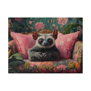 May include: A small, furry creature with large, red eyes sits in a floral armchair. The creature has a white face and black fur. The armchair is covered in a pink and floral patterned fabric.