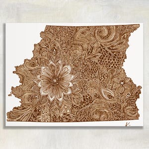 May include: Brown and white artwork of the state of Indiana, filled with intricate patterns and a central floral design. The artwork is a detailed illustration, showcasing a variety of textures and shapes, perfect for home decor.