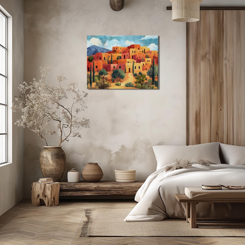 Warm toned pueblo hillside with arched doorways, small windows, and layered homes.