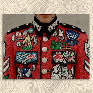 May include: A red beaded jacket with a black collar and silver buttons. The jacket is decorated with colourful patches and embellishments, including stars, flowers, and geometric shapes. The shoulder epaulettes are black with silver accents.