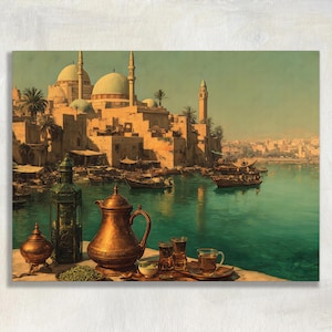 May include: An artistic print depicts a Middle Eastern cityscape with a turquoise sea and boats. A copper tea pot, glasses, and a decorative lantern are in the foreground. The buildings have domes and minarets, with palm trees adding to the scene.