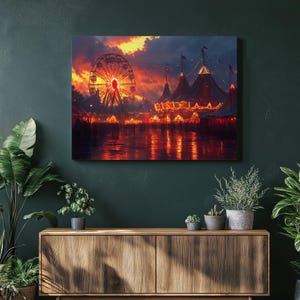 May include: A canvas print showing a carnival at dusk. A lit Ferris wheel and circus tents are set against a fiery orange and dark blue sky. The scene is reflected in the water below, creating a dramatic effect.