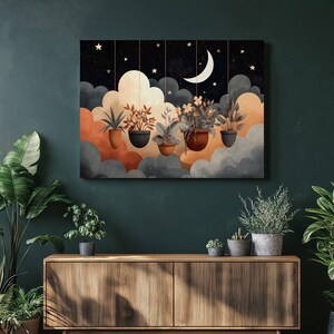 May include: A canvas art print depicts a nighttime scene with a crescent moon and stars. Five potted plants hang from the sky against a backdrop of clouds in shades of orange, gray, and white. The plants are in dark brown pots.