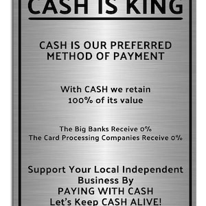 May include: A rectangular metal sign with rounded corners and the text "CASH IS KING" at the top. The sign promotes cash payments with additional text about retaining value and supporting local businesses.