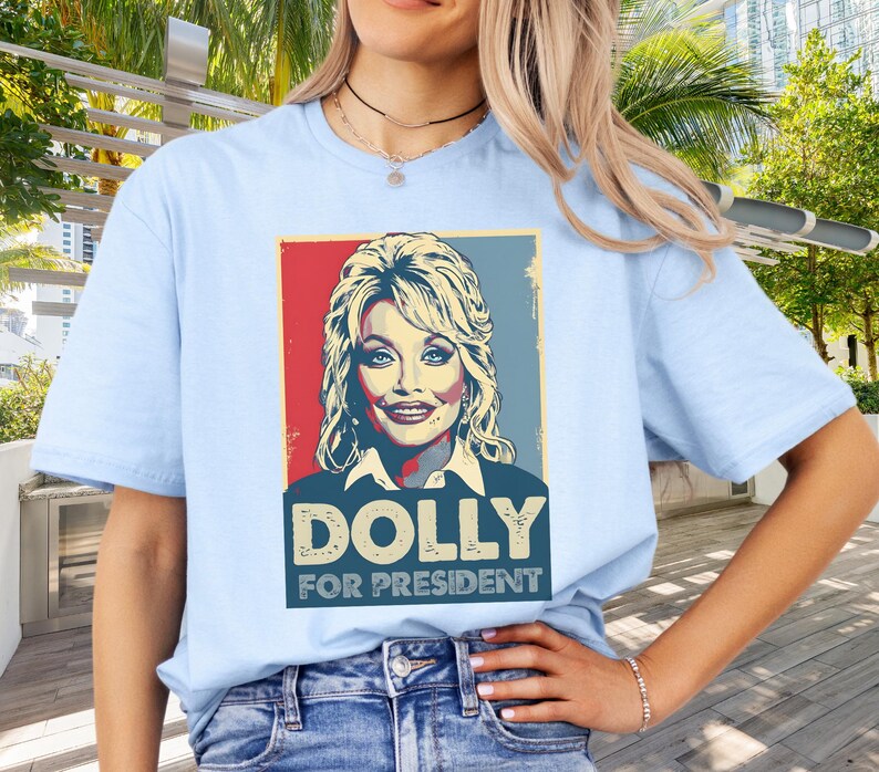 Dolly Parton Tshirt | Dolly for President | Dolly Parton Gifts | What Would Dolly Do | In Dolly We Trust | Dolly Parton Shirt | MAGA Light Blue