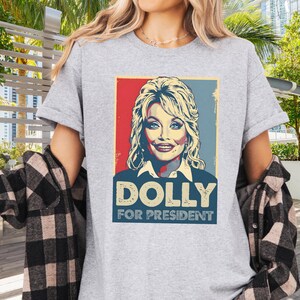 Dolly Parton Tshirt | Dolly for President | Dolly Parton Gifts | What Would Dolly Do | In Dolly We Trust | Dolly Parton Shirt | MAGA Sport Grey