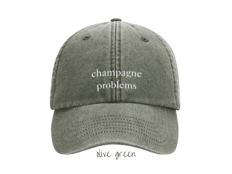 Cap Champagne Problems washed dad cap Taylor khaki olive dunkelgrün low profile baseballcap TheSwiftShopDE Tour Outfit Bild 1