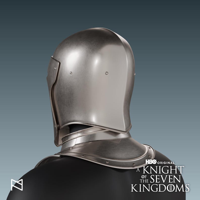 May include: A silver-colored knight's helmet, featuring a rounded top and a neck guard. The helmet has a smooth, metallic finish and is designed to protect the head and neck. The HBO Original logo and the text "A Knight of the Seven Kingdoms" are visible.