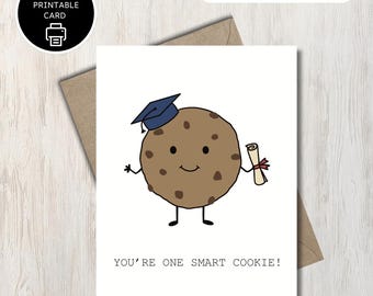 May include: A white printable card featuring a cartoon cookie wearing a graduation cap and holding a scroll. The card reads "YOU'RE ONE SMART COOKIE!" and is on a brown envelope. The image also includes the text "Includes 2 sizes!"