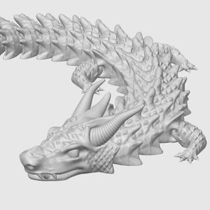 May include: A three-dimensional, light gray dragon figurine. The dragon has a detailed, textured body with horns, spikes, and a long, curved tail. The dragon is in a resting pose, with its head and tail curved.