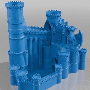 May include: A blue miniature castle model with multiple turrets, arched windows, and a dragon sculpture. The castle has a detailed design and is likely a decorative item or a piece for a tabletop game.