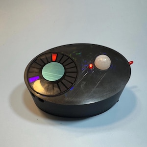 Music box round  vibration sensor motion detector - Ghost hunting equipment - Ghost hunting kit tools - Paranormal investigation